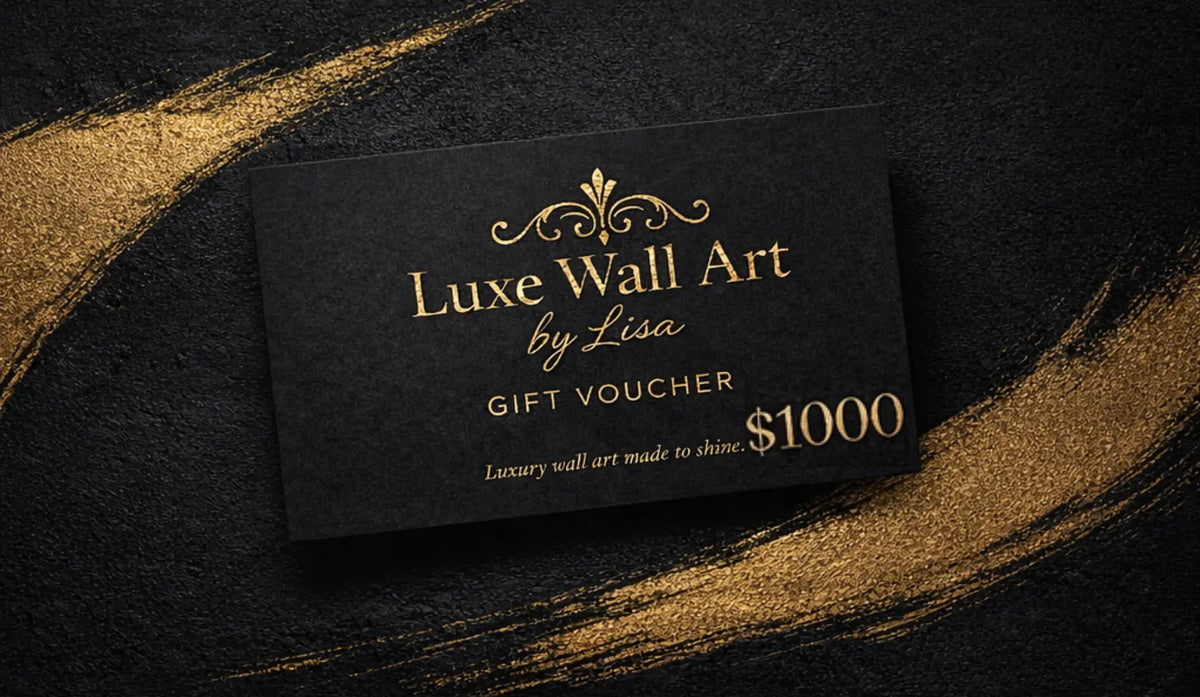 $1000 luxury online gift voucher from Luxe Wall Art by Lisa with a black textured background, dramatic gold brushstroke accents, and elegant gold foil lettering.