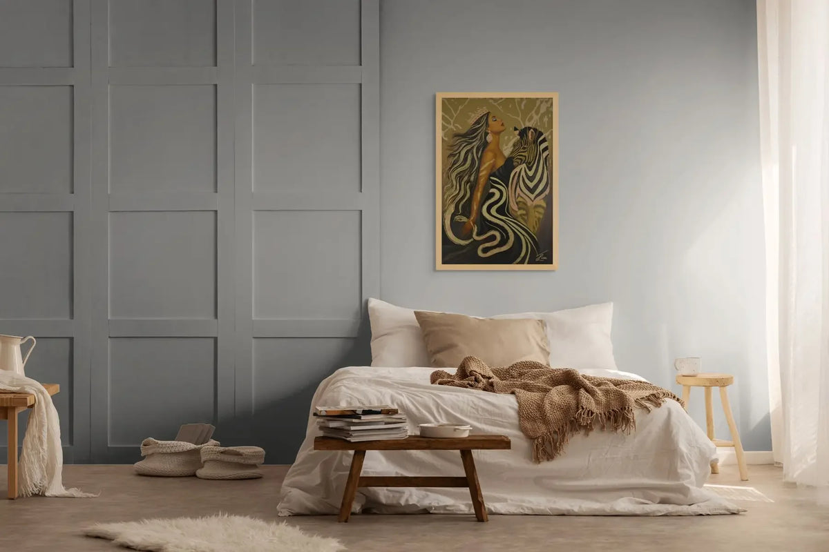 Modern bedroom with grey panelled walls, a bed with pillows and blanket, and a gold leaf original painting styled above the bed.