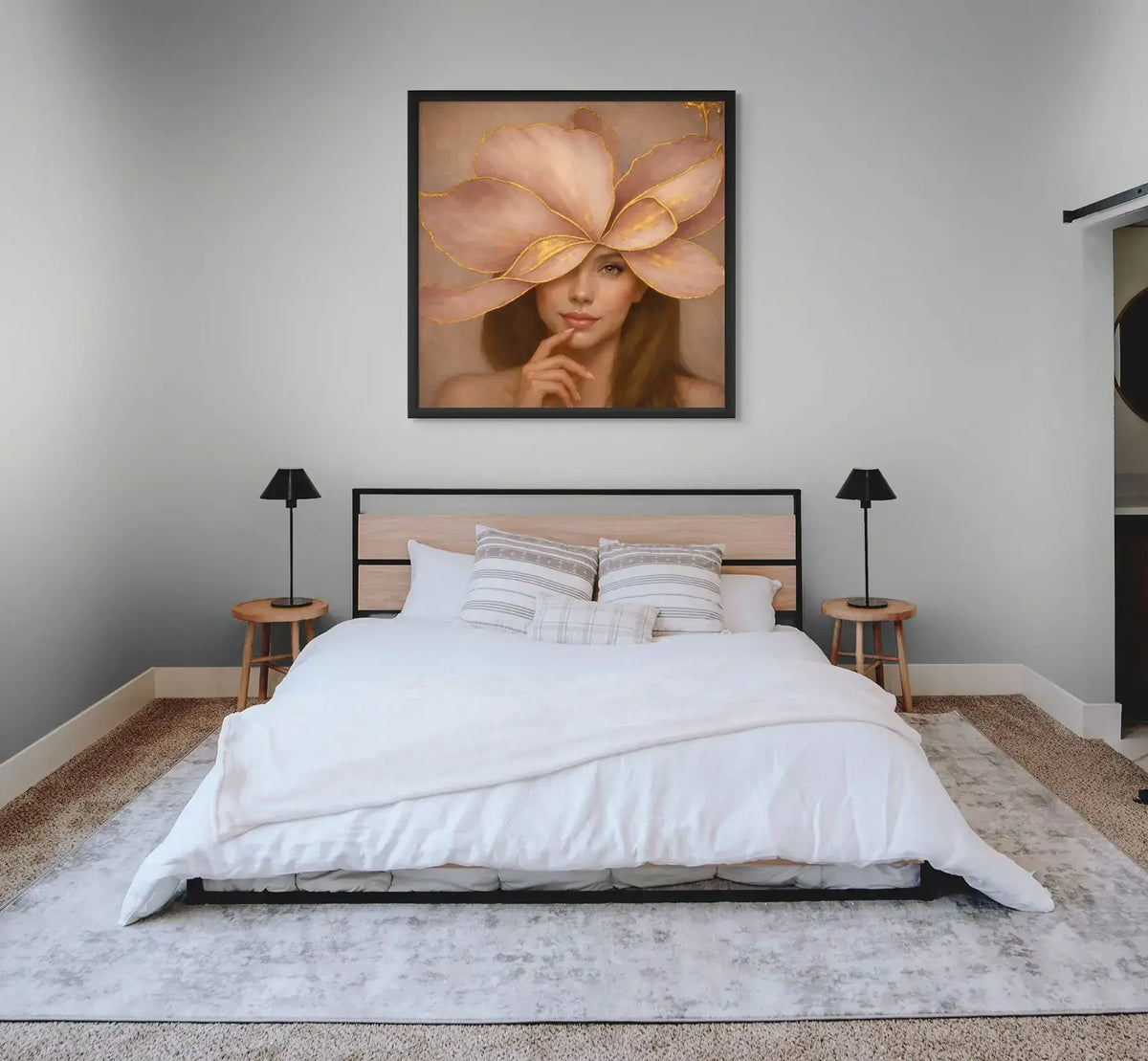 Luxury gold leaf portrait painting Gilded Honey II styled in a black frame above a bed in a calm, contemporary bedroom interior.