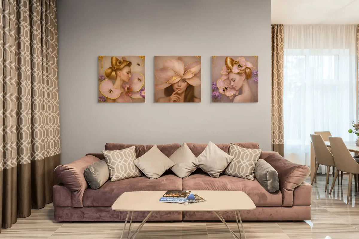 Luxury gold leaf portrait triptych Gilded Honey displayed unframed above a neutral sofa in a contemporary interior setting.