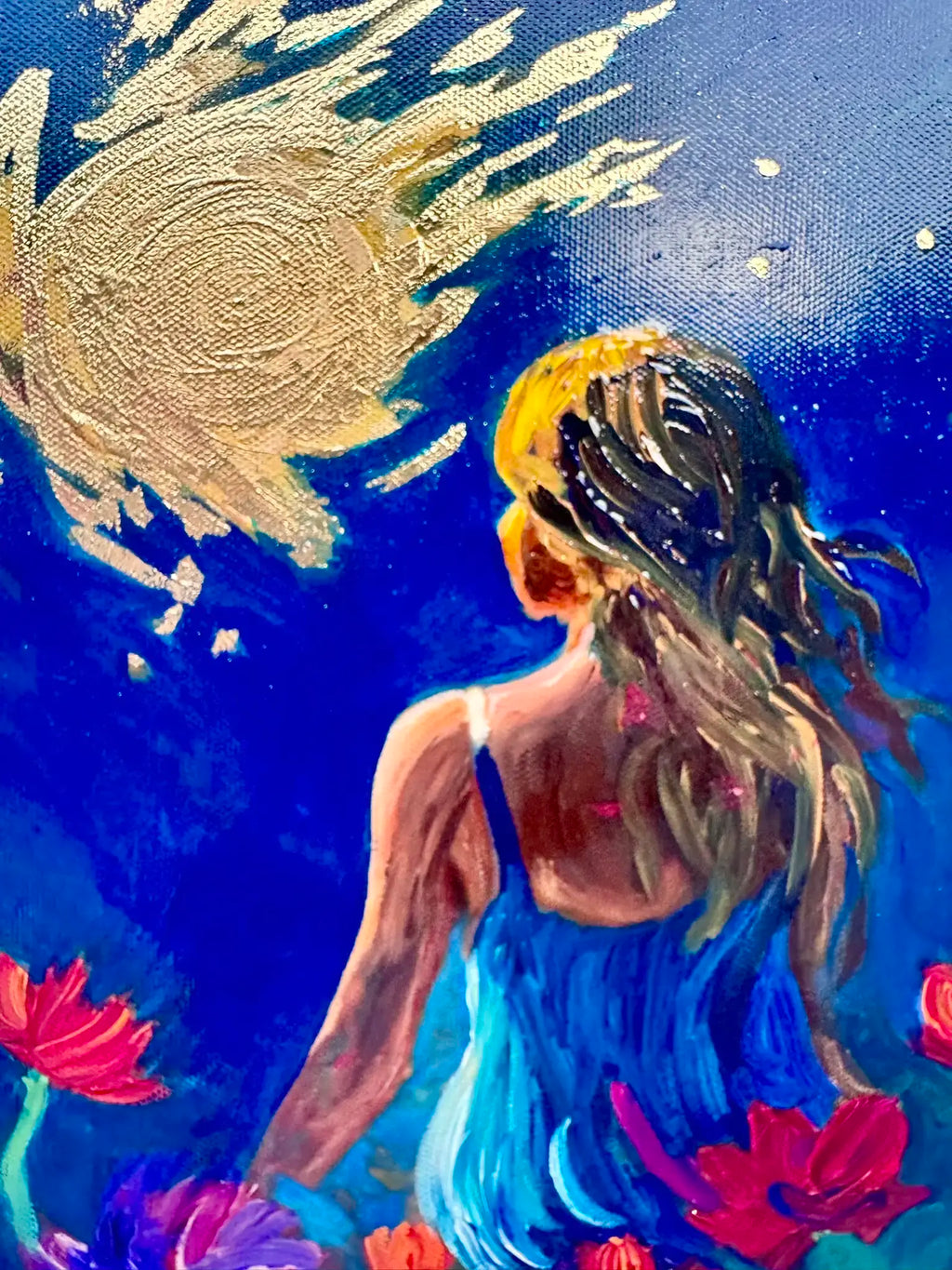 Close-up detail of gold leaf texture and vibrant couture florals from the Stellar Petals original painting with flowing hair and flowers and blue background.